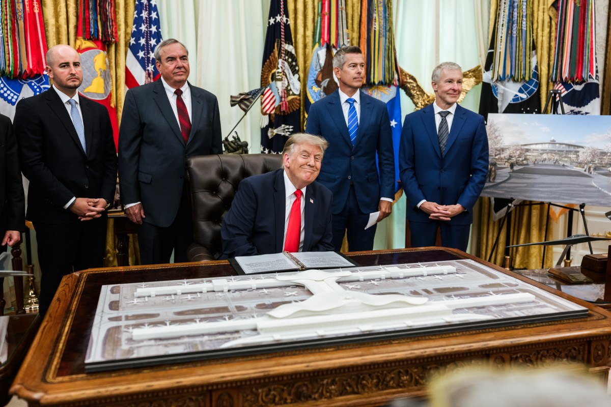 President Donald J. Trump makes an announcement regarding Dulles International Airport alongside Transportation Secretary Sean Duffy in the Oval Office, Wednesday, July 29, 2026. (Official White House Photo by Molly Riley)