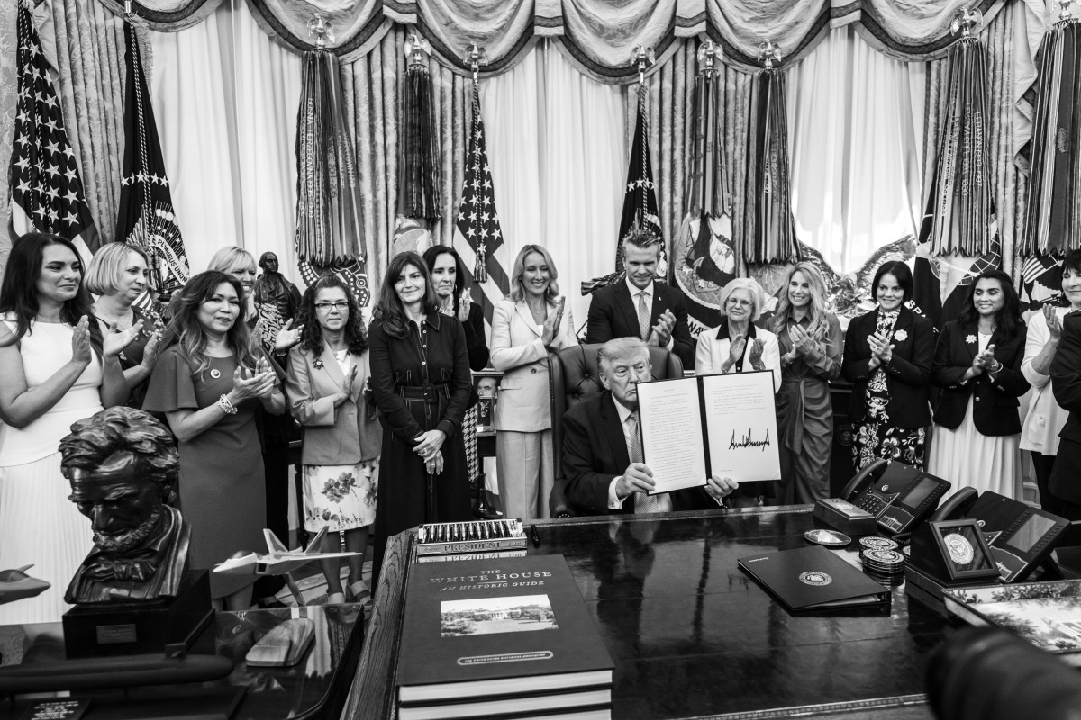 President Donald J. Trump, joined by Secretary of War Pete Hegseth and wife Jennifer Hegseth, signs an executive order creating a new White House commission focused on military families, Monday, August 3, 2026, in the Oval Office. (Official White House Photo by Molly Riley)