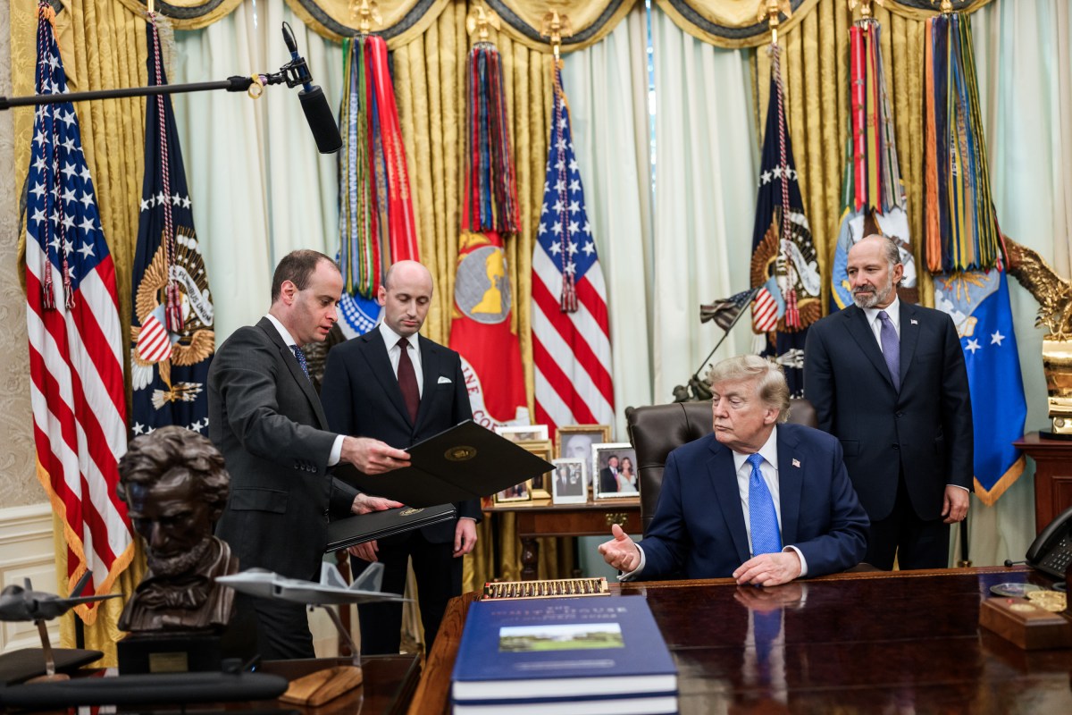 President Donald J. Trump signs Executive Orders alongside Deputy Chief of Staff Stephen Miller and Secretary of Commerce Howard Lutnick in the Oval Office, Thursday, August 6, 2026.(Official White House Photo by Molly Riley)