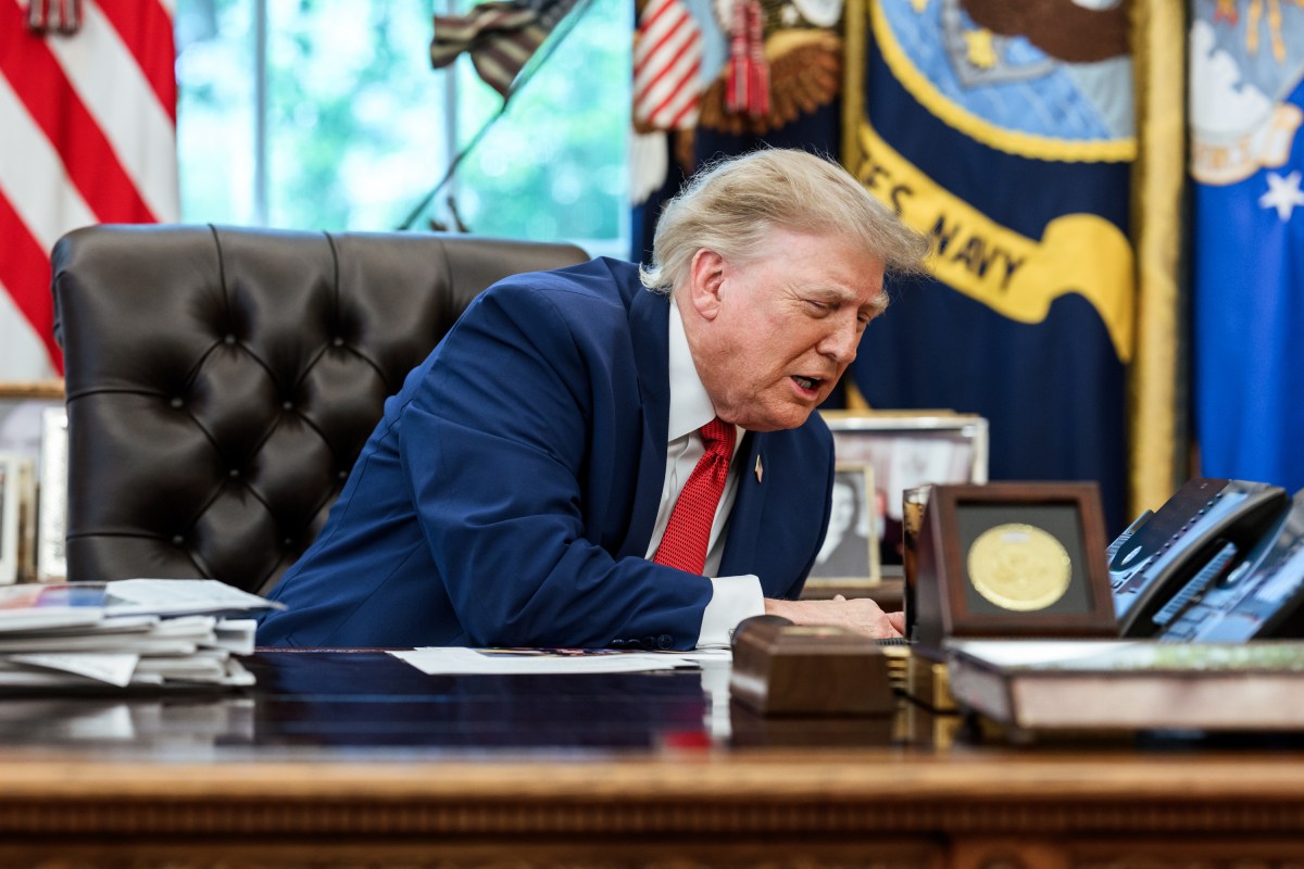 President Donald J. Trump speaks on the phone with freed Russian hostage U.S. Marine veteran Robert Gilman, Tuesday, August 11, 2026, in the Oval Office. (Official White House Photo by Joyce N. Boghosian)