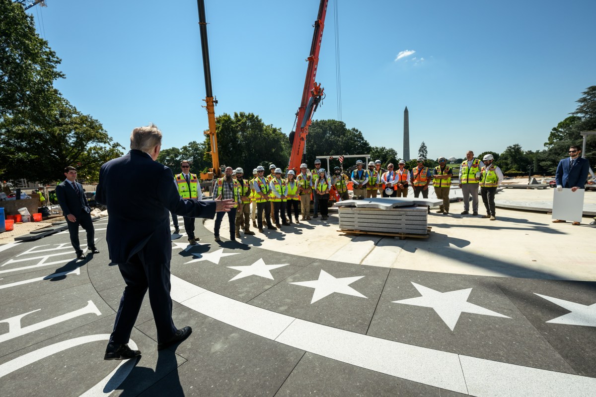 President Donald J. Trump shows members of the media the White House helipad under construction on the South Lawn, Wednesday, August 19, 2026. (Official White House Photo by Joyce N. Boghosian)