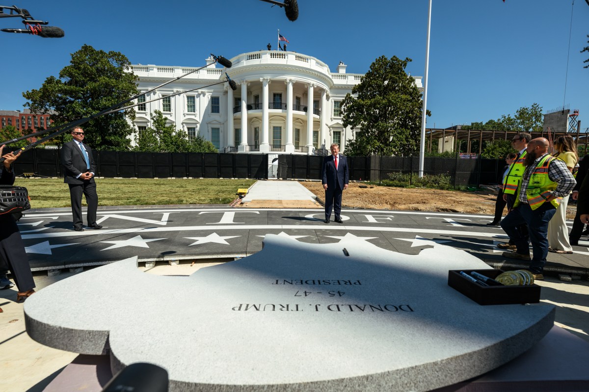 President Donald J. Trump shows members of the media the White House helipad under construction on the South Lawn, Wednesday, August 19, 2026. (Official White House Photo by Joyce N. Boghosian)