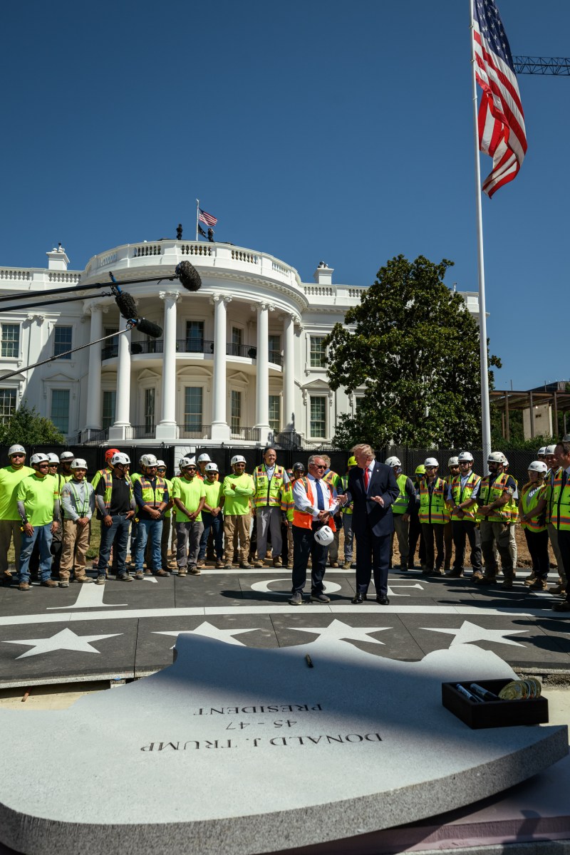 President Donald J. Trump shows members of the media the White House helipad under construction on the South Lawn, Wednesday, August 19, 2026. (Official White House Photo by Joyce N. Boghosian)