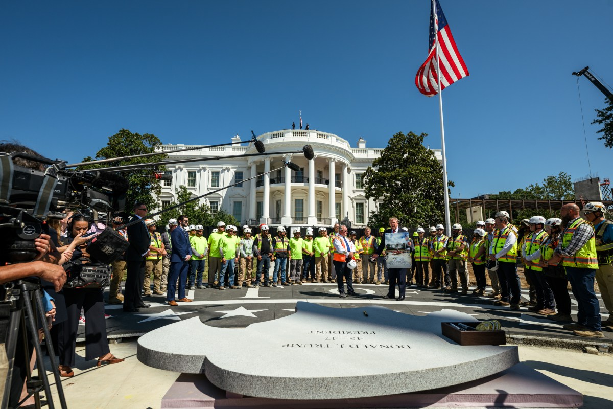 President Donald J. Trump shows members of the media the White House helipad under construction on the South Lawn, Wednesday, August 19, 2026. (Official White House Photo by Joyce N. Boghosian)