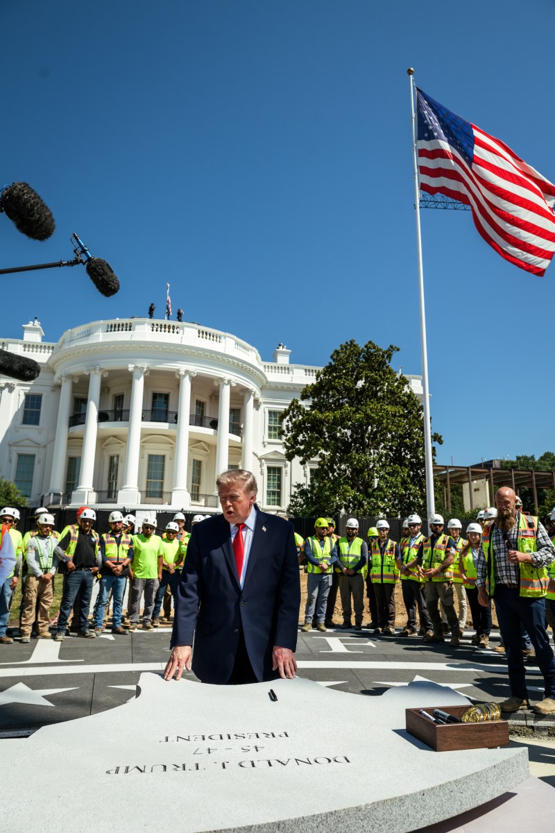 President Donald J. Trump shows members of the media the White House helipad under construction on the South Lawn, Wednesday, August 19, 2026. (Official White House Photo by Joyce N. Boghosian)