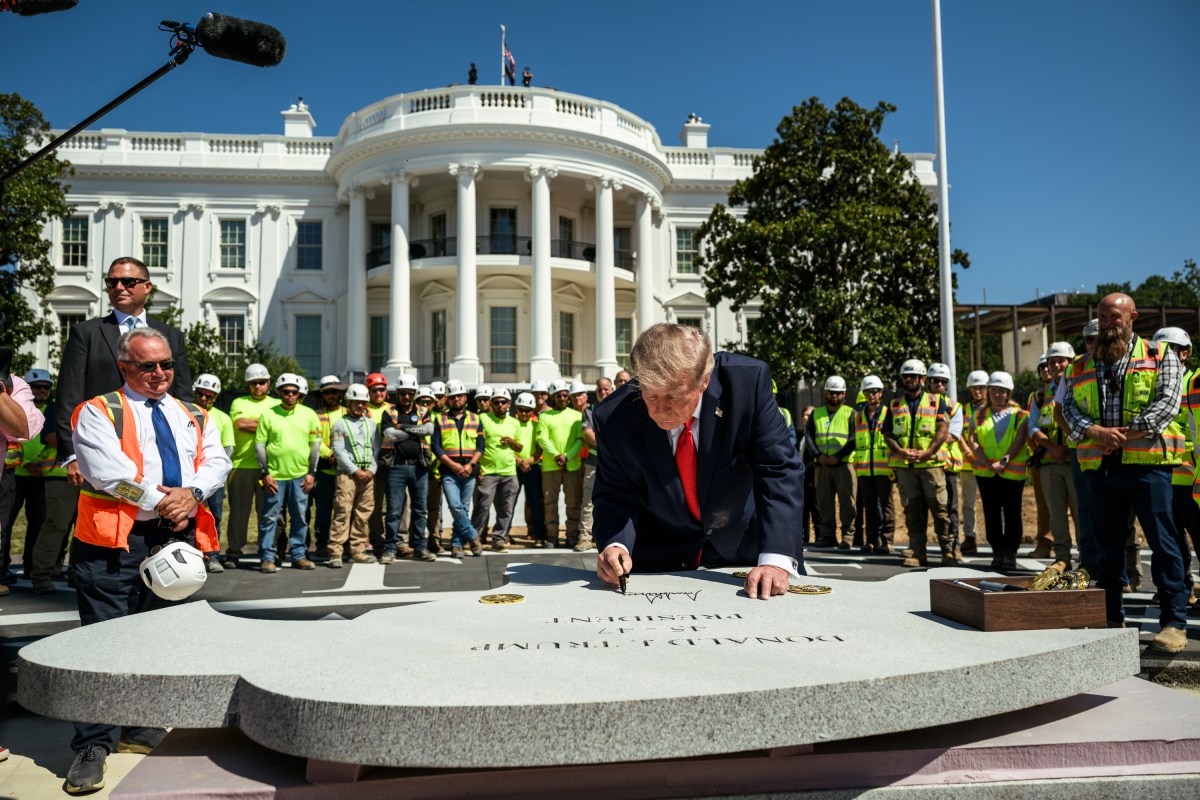 President Donald J. Trump shows members of the media the White House helipad under construction on the South Lawn, Wednesday, August 19, 2026. (Official White House Photo by Joyce N. Boghosian)