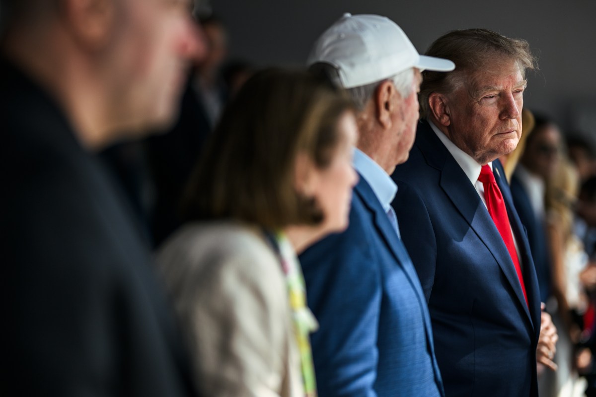 President Donald J. Trump and First Lady Melania Trump participate in the Green Flag Presentation before the Freedom 250 Grand Prix Race in Washington, D.C., Sunday, August 23, 2026. (Official White House Photo by Daniel Torok)