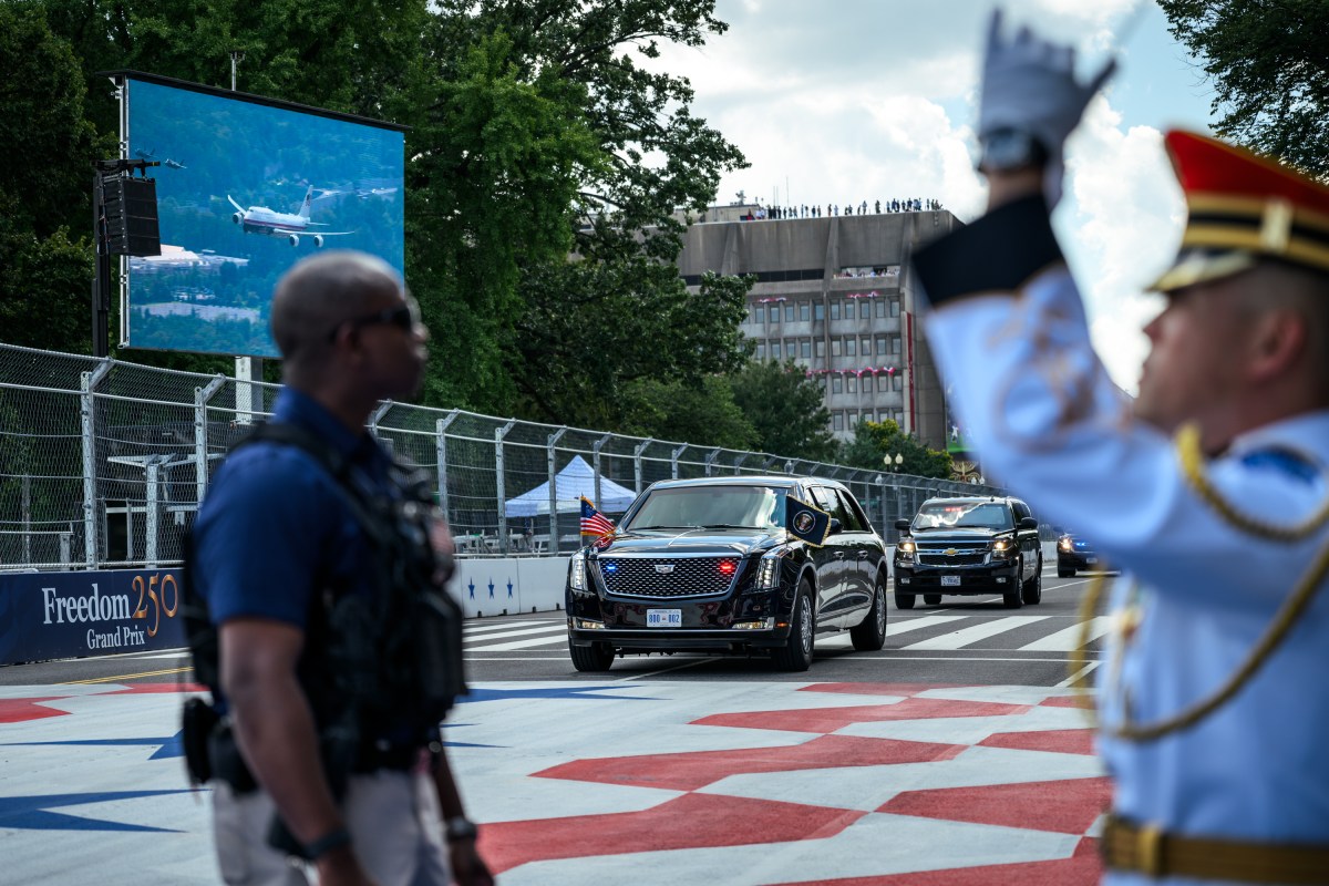 President Donald J. Trump and First Lady Melania Trump watch a military flyover after taking a ceremonial lap in the motorcade during the Freedom 250 Grand Prix Race in Washington, D.C., Sunday, August 23, 2026. (Official White House Photo by Molly Riley)