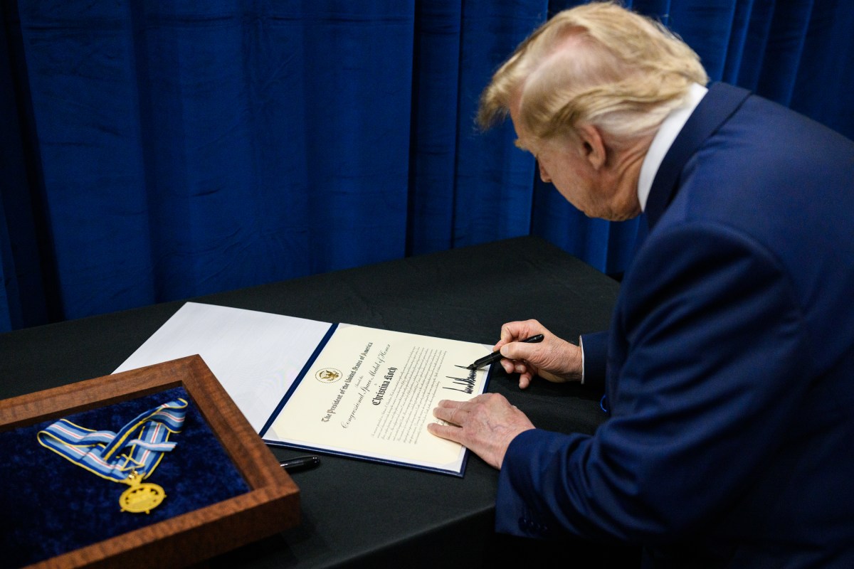 President Donald J. Trump signs certificates a Congressional Space Medal of Honor Ceremony at the NASA Johnson Space Center, Friday, August 28, 2026, in Houston, Texas. (Official White House Photo by Daniel Torok)
