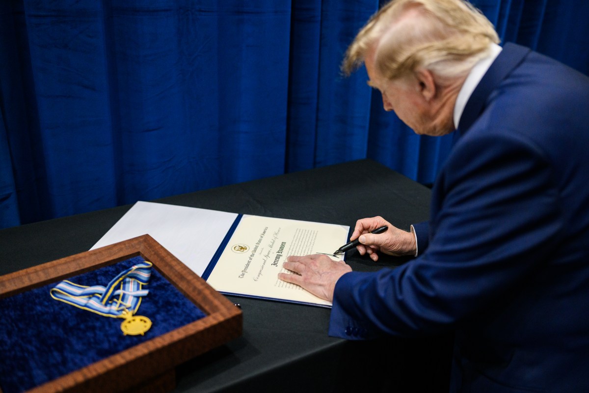 President Donald J. Trump signs certificates a Congressional Space Medal of Honor Ceremony at the NASA Johnson Space Center, Friday, August 28, 2026, in Houston, Texas. (Official White House Photo by Daniel Torok)