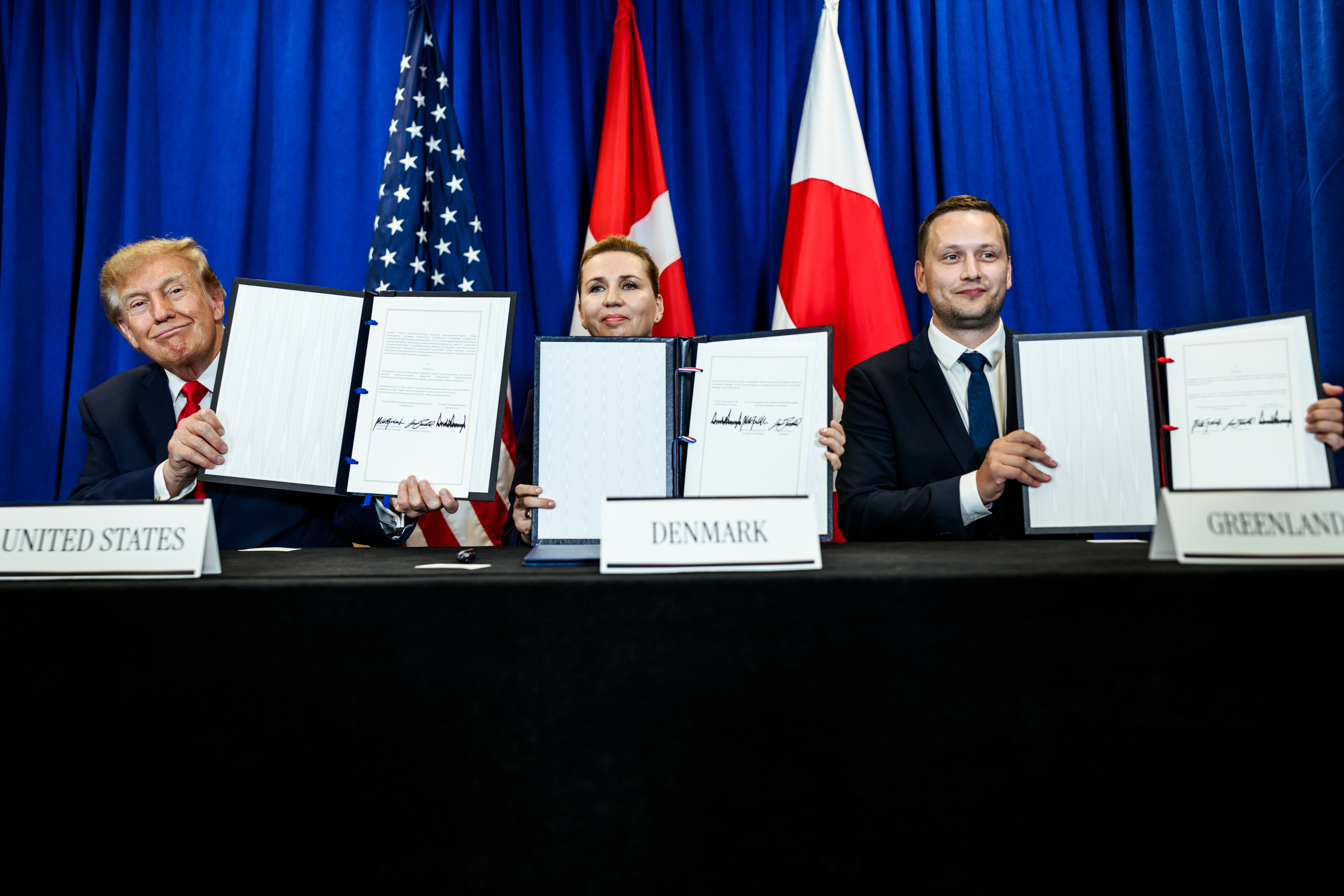 President Donald J. Trump participates in a trilateral signing ceremony with Prime Minister Mette Frederiksen of Denmark and Prime Minister Jans-Frederik Nielsen of Greenland, Tuesday, September 22, 2026, at United Nations Headquarters in New York City. (Official White House Photo by Daniel Torok)