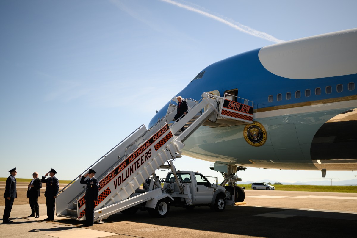President Donald J. Trump is met by Brig. Gen Martin Hartley, 134th Air Refueling Wing Commander Col Ronald Selvidge and 134th Command Chief MSgt James Cutshaw as he disembarks Air Force One at McGhee Tyson National Guard Airbase in Louisville, Tennessee, Saturday, September 26, 2026.