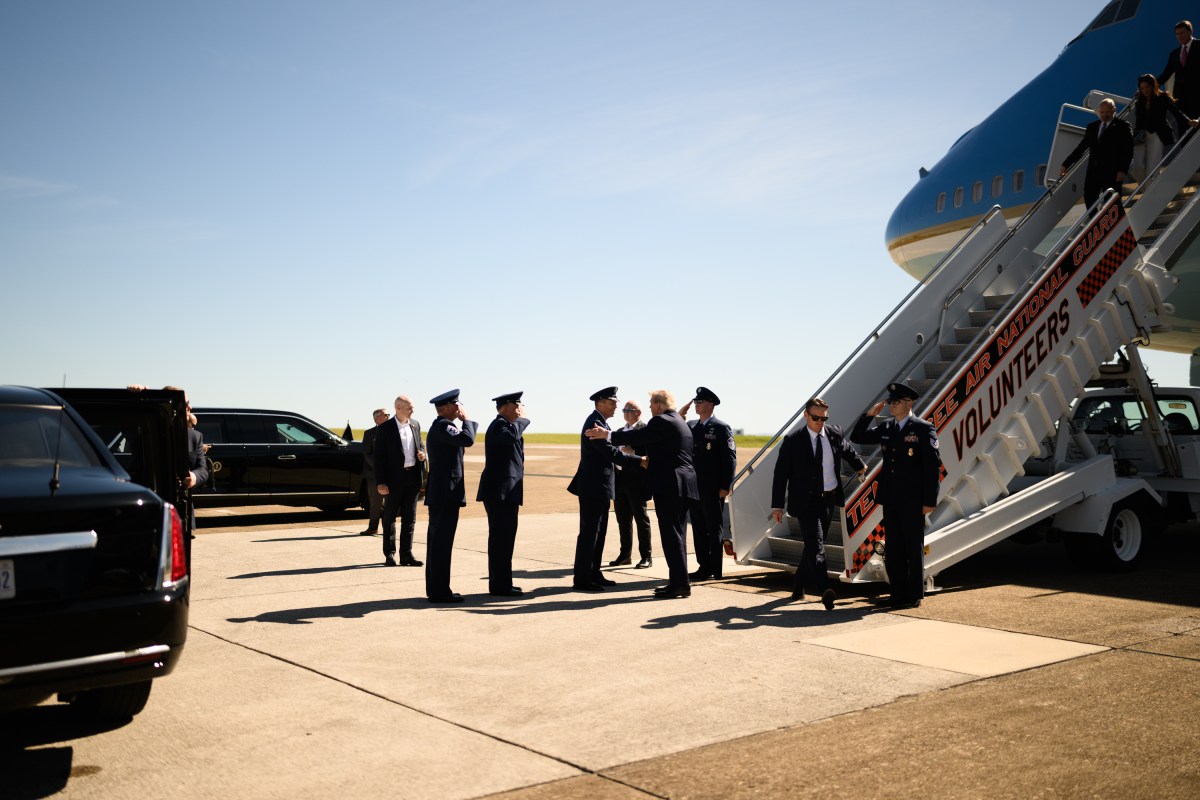 President Donald J. Trump is met by Brig. Gen Martin Hartley, 134th Air Refueling Wing Commander Col Ronald Selvidge and 134th Command Chief MSgt James Cutshaw as he disembarks Air Force One at McGhee Tyson National Guard Airbase in Louisville, Tennessee, Saturday, September 26, 2026.