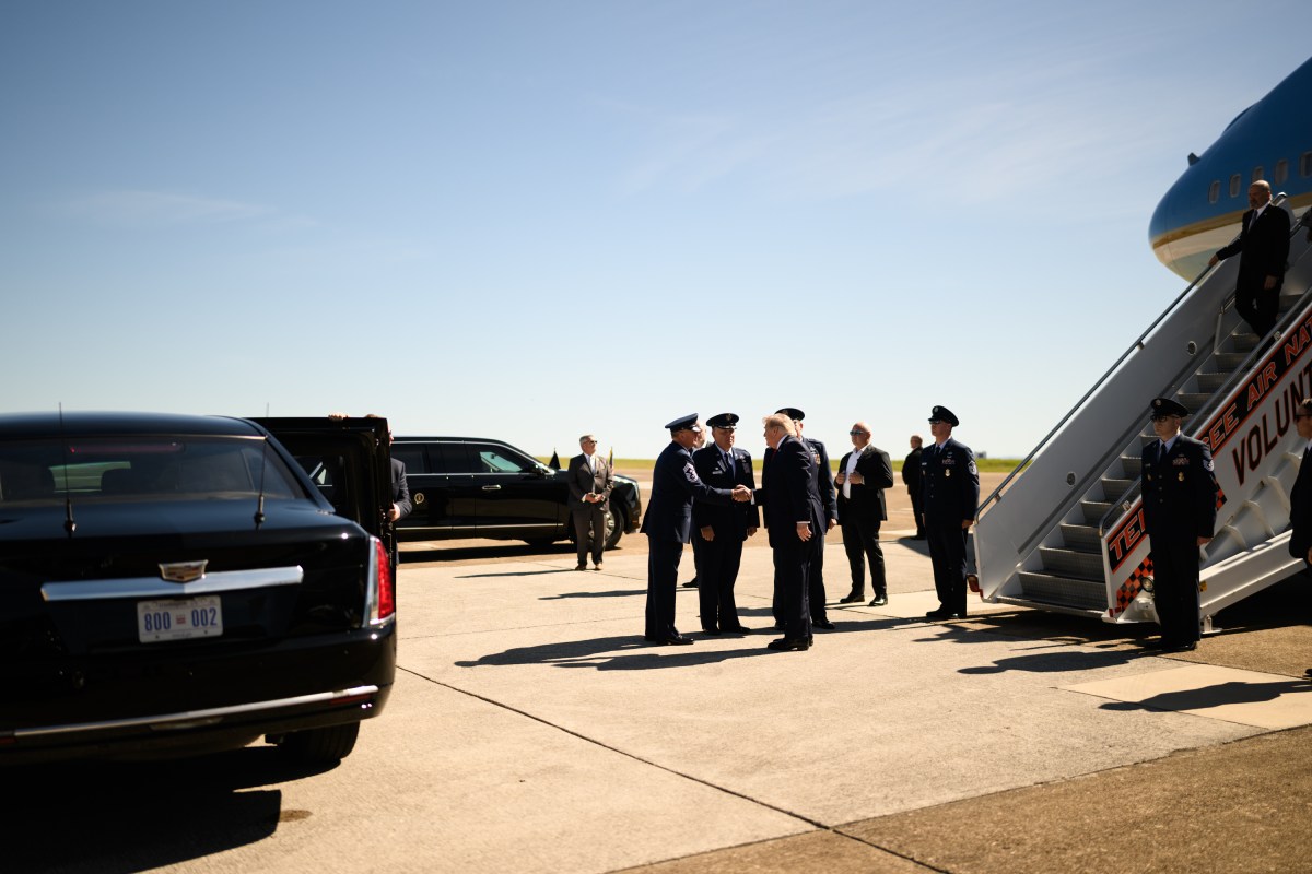 President Donald J. Trump is met by Brig. Gen Martin Hartley, 134th Air Refueling Wing Commander Col Ronald Selvidge and 134th Command Chief MSgt James Cutshaw as he disembarks Air Force One at McGhee Tyson National Guard Airbase in Louisville, Tennessee, Saturday, September 26, 2026.