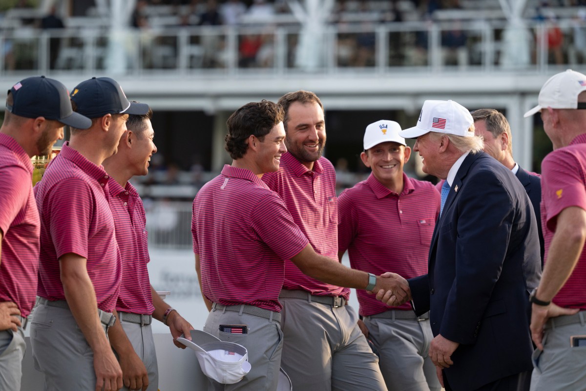 President Donald J. Trump presents the President’s Cup Trophy to the USA Team Captain Brandt Snedeker  after winning the 2026 President’s Cup on Sunday, September 27, 2026, at Medinah Country Club in Medinah, Illinois. (Official White House photo by Joyce N. Boghosian)