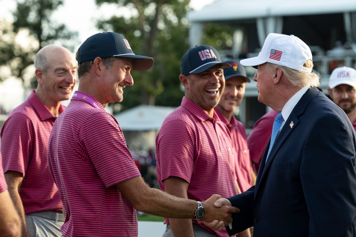 President Donald J. Trump presents the President’s Cup Trophy to the USA Team Captain Brandt Snedeker  after winning the 2026 President’s Cup on Sunday, September 27, 2026, at Medinah Country Club in Medinah, Illinois. (Official White House photo by Joyce N. Boghosian)
