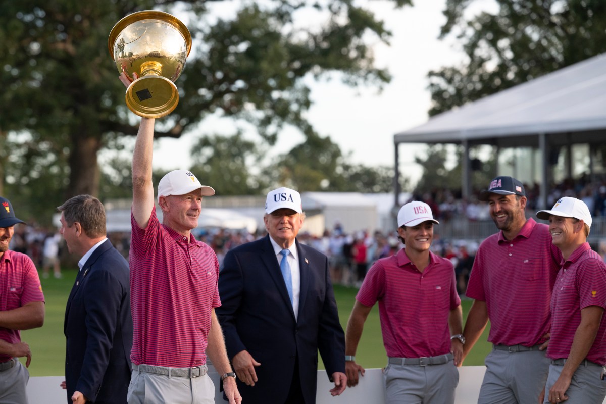 President Donald J. Trump presents the President’s Cup Trophy to the USA Team Captain Brandt Snedeker  after winning the 2026 President’s Cup on Sunday, September 27, 2026, at Medinah Country Club in Medinah, Illinois. (Official White House photo by Joyce N. Boghosian)