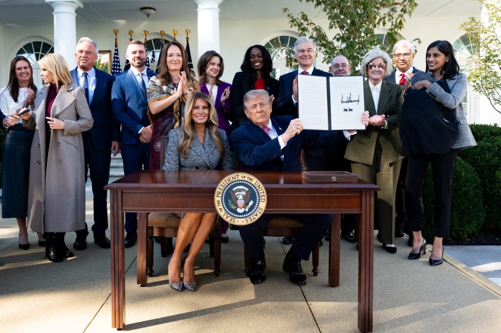 President Donald J. Trump and First Lady Melania Trump sign an executive order creating a new Women’s Health Division at the National Institutes of Health and a White House Women’s Health Task Force, Monday, October 19, 2026, in the White House Rose Garden. (Official White House Photo by Andrea Hanks)