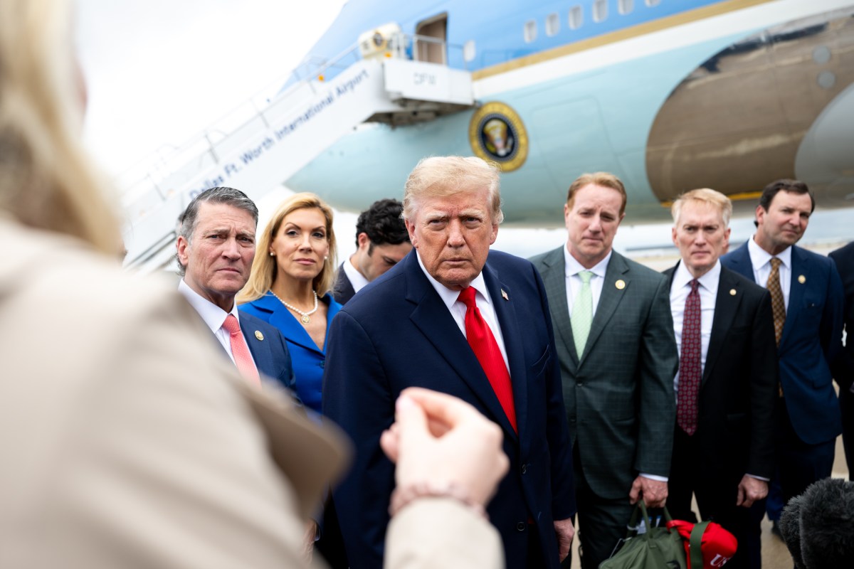 President Donald J. Trump disembarks Air Force One with members of Congress and speaks to the press, at Dallas Fort Worth International Airport, Texas on Thursday, October 1, 2026. (Official White House Photo by Molly Riley)