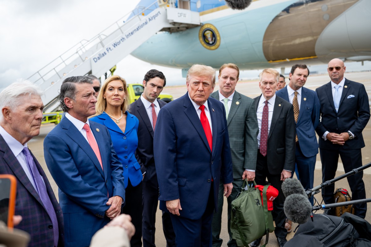 President Donald J. Trump disembarks Air Force One with members of Congress and speaks to the press, at Dallas Fort Worth International Airport, Texas on Thursday, October 1, 2026. (Official White House Photo by Molly Riley)