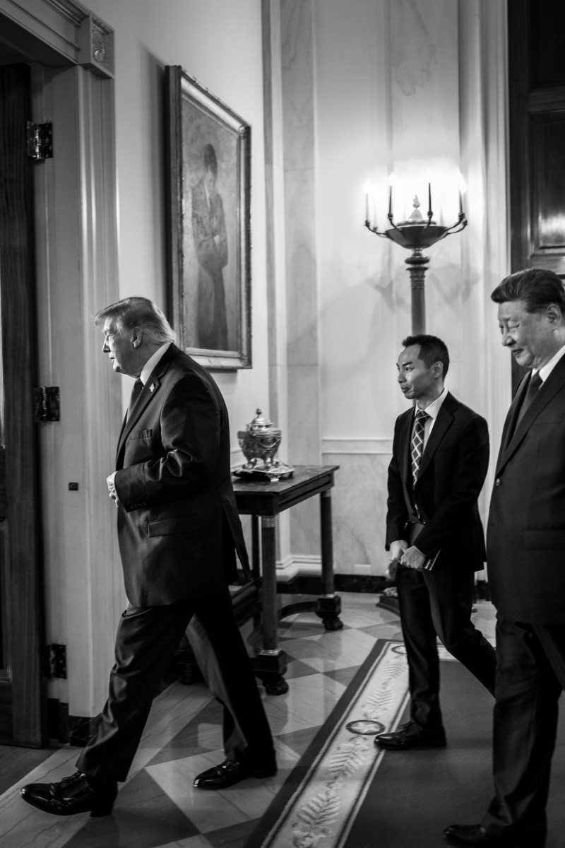 President Donald J. Trump and First Lady Melania Trump look at a photo book with Chinese President Xi Jinping and Madame Peng Liyuan before tea in the Red Room of the White House, Friday, September 25, 2026. (Official White House Photo by Molly Riley)