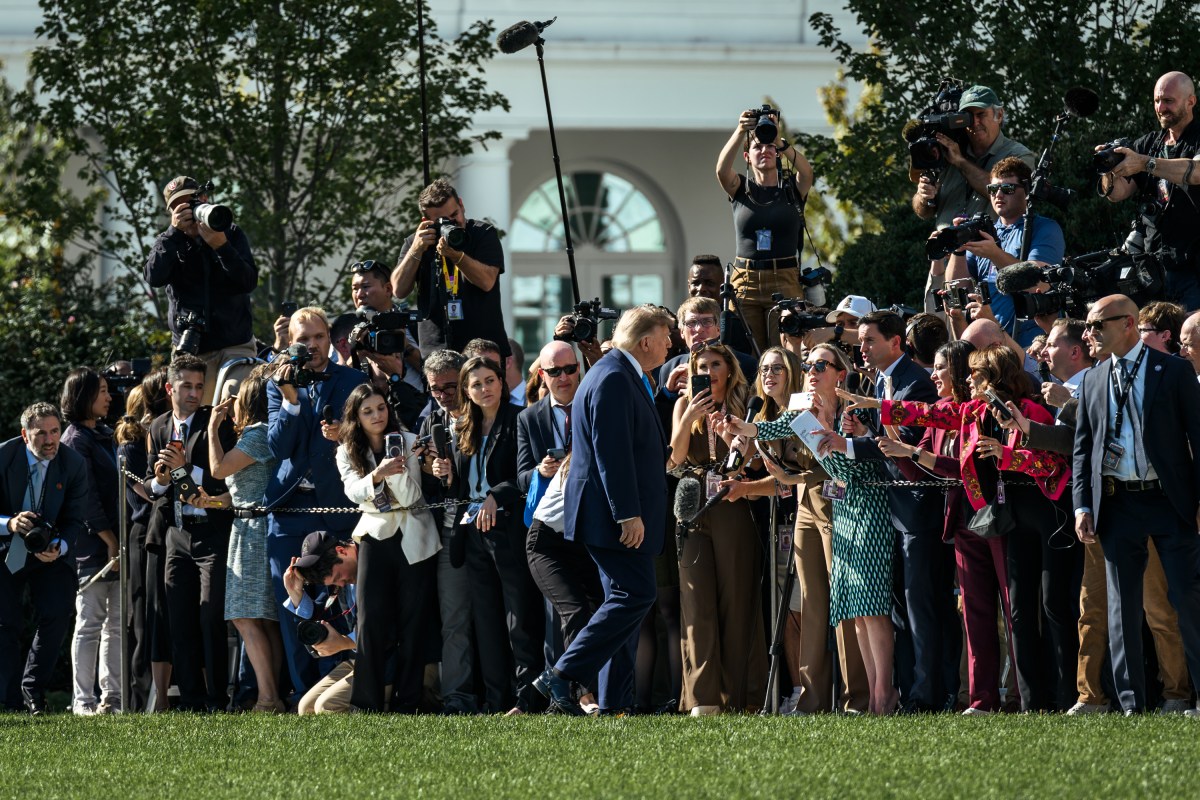 President Donald J. Trump speaks with members of the media before boarding Marine One on the South Lawn, Monday, October 5, 2026, en route Joint Base Andrews for a trip to Nebraska. (Official White House Photo by Molly Riley)