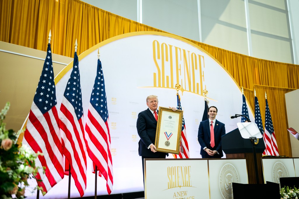 President Donald J. Trump presents the National Medal of Science to tech company leaders at a “New Golden Age” summit with tech and science leaders at the Donald J. Trump Institute of Peace in Washington, D.C., Thursday, October 8, 2026. (Official White House Photo by Daniel Torok)