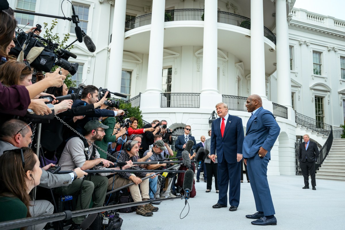 President Donald J. Trump speaks with members of the media alongside Mike Tyson before boarding Marine One on the South Lawn of the White House, Friday, October 9, 2026, en route to Joint Base Andrews for a trip to Syracuse, New York. (Official White House Photo by Joyce N. Boghosian)