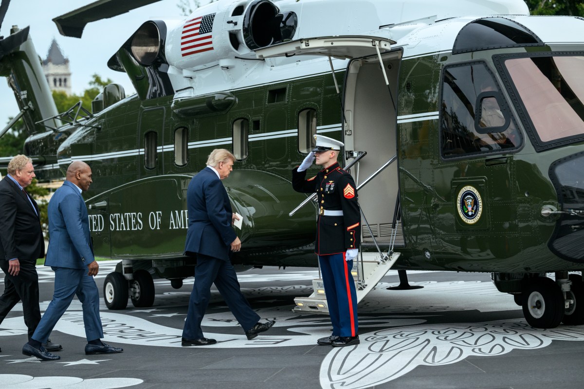 President Donald J. Trump and Mike Tyson board Marine One on the South Lawn of the White House, Friday, October 9, 2026, en route to Joint Base Andrews for a trip to Syracuse, New York. (Official White House Photo by Joyce N. Boghosian)