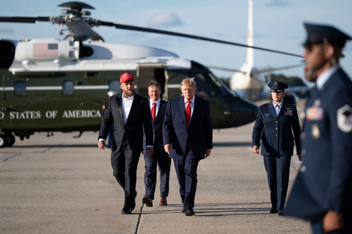 President Donald J. Trump disembarks Marine One at Joint Base Andrews, Maryland on Monday, October 12, 2026, with Jake Paul and boards Air Force One en route Youngstown, Ohio. (Official White House photo by Joyce N. Boghosian)