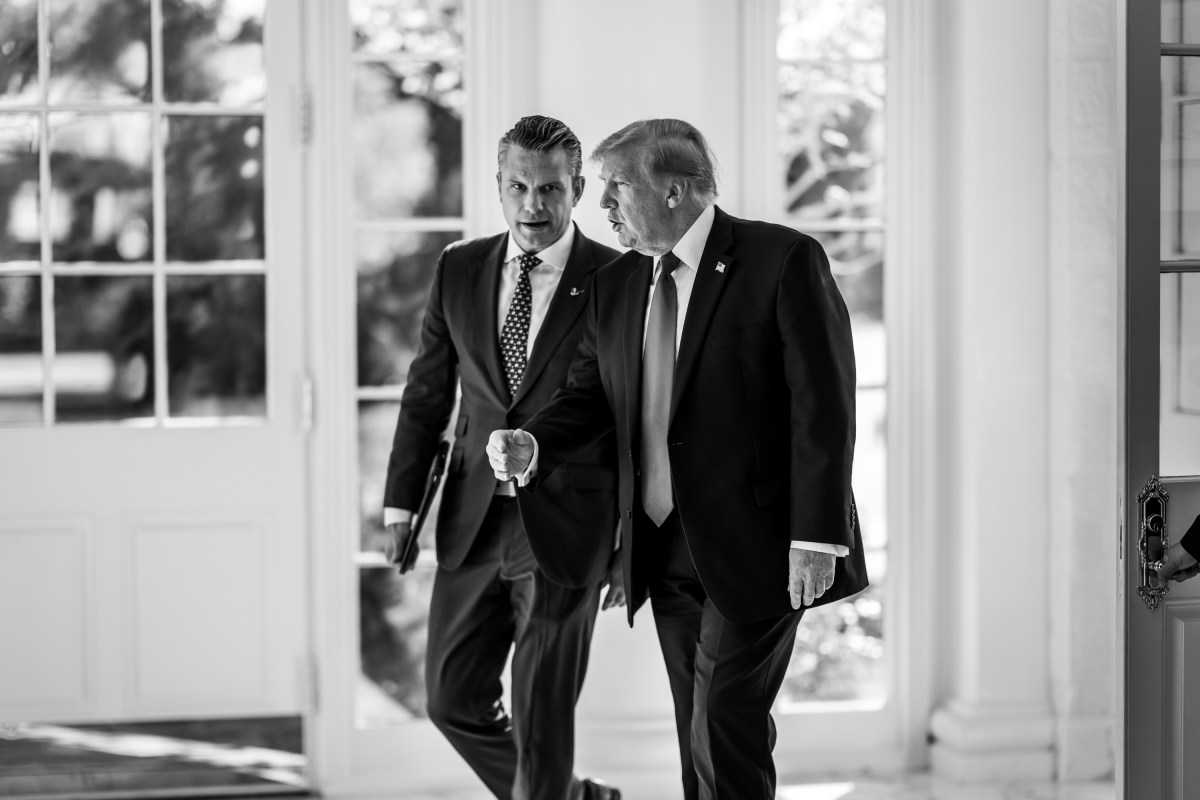 President Donald J. Trump walks on the West Colonnade with White House Chief of Staff Susie Wiles, Secretary of War Pete Hegseth, and others, Wednesday, October 21, 2026. (Official White House Photo by Daniel Torok)