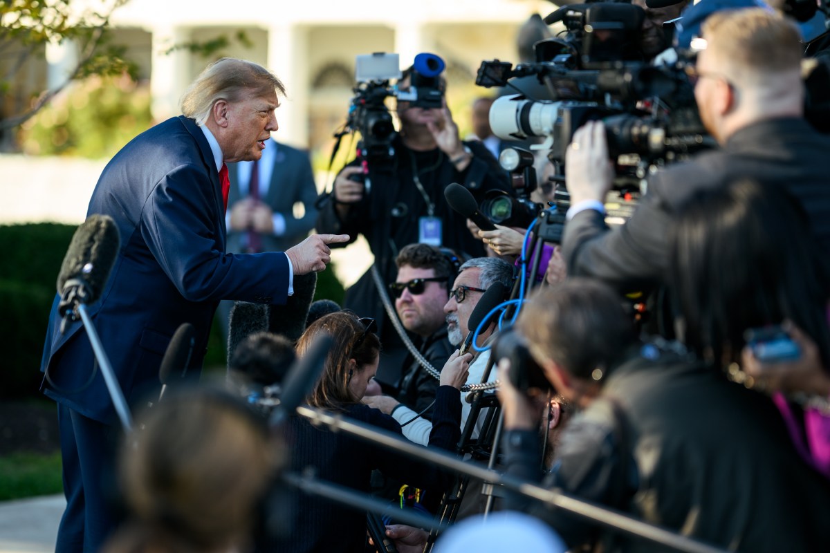 President Donald J. Trump speaks with members of the media before boarding Marine One on the South Lawn of the White House, Wednesday, October 21, 2026, en route Joint Base Andrews for a campaign trip to Clemson, South Carolina. (Official White House Photo by Daniel Torok)