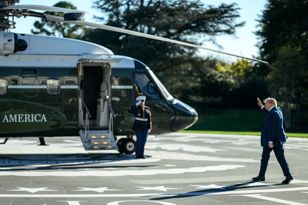 President Donald J. Trump boards Marine One on the South Lawn of the White House, Wednesday, October 21, 2026, en route Joint Base Andrews for a campaign trip to Clemson, South Carolina. (Official White House Photo by Daniel Torok)