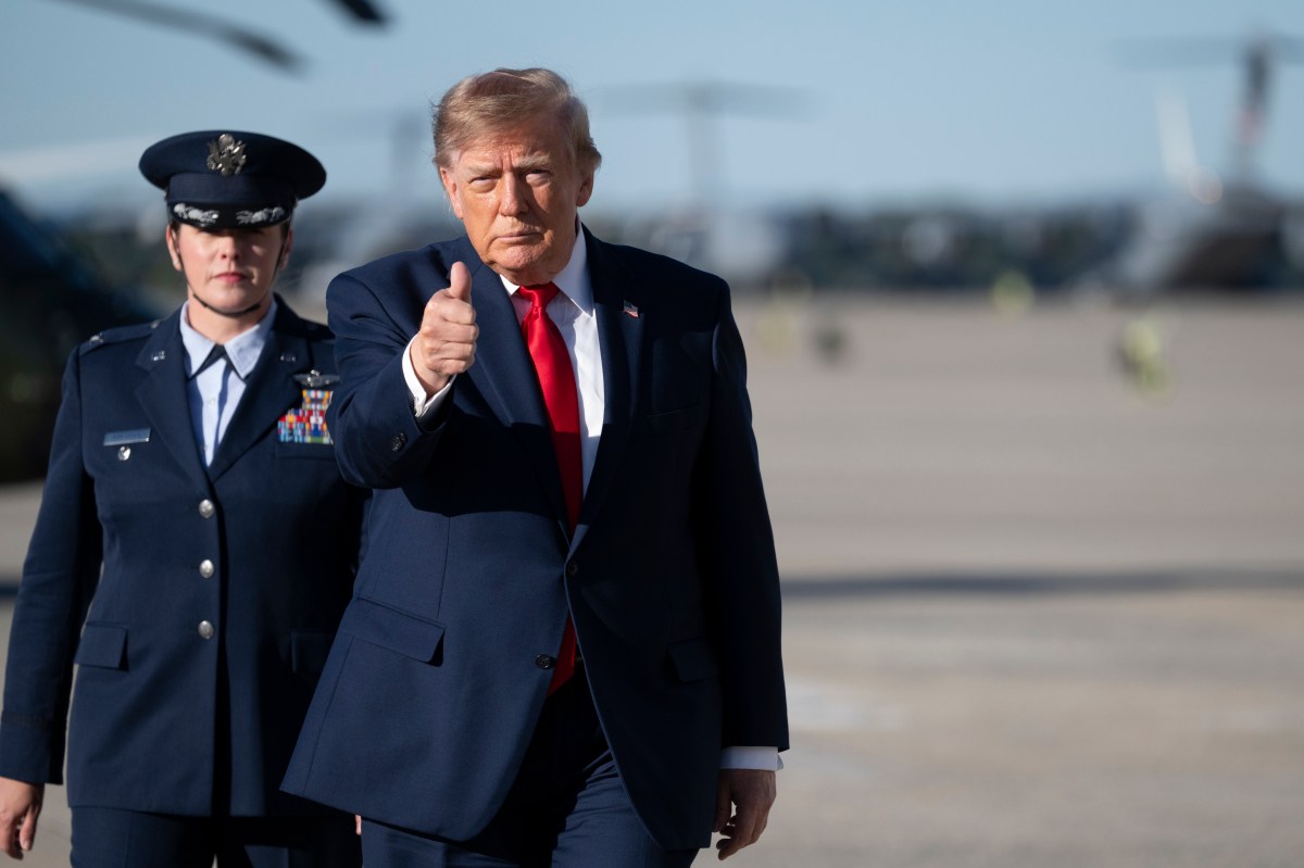 President Donald J. Trump disembarks Marine One at Joint Base Andrews, Maryland and boards Air Force One for a campaign trip to Clemson, South Carolina, Wednesday, October 21, 2026. (Official White House photo by Joyce N. Boghosian)