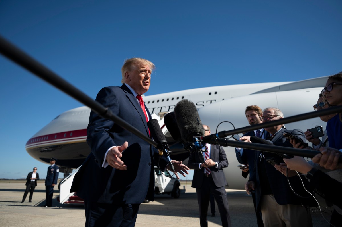 President Donald J. Trump disembarks Marine One at Joint Base Andrews, Maryland and speaks to the press before boarding Air Force One for a campaign trip to Port Huron, Michigan, Sunday, October 25, 2026. (Official White House photo by Joyce N. Boghosian)