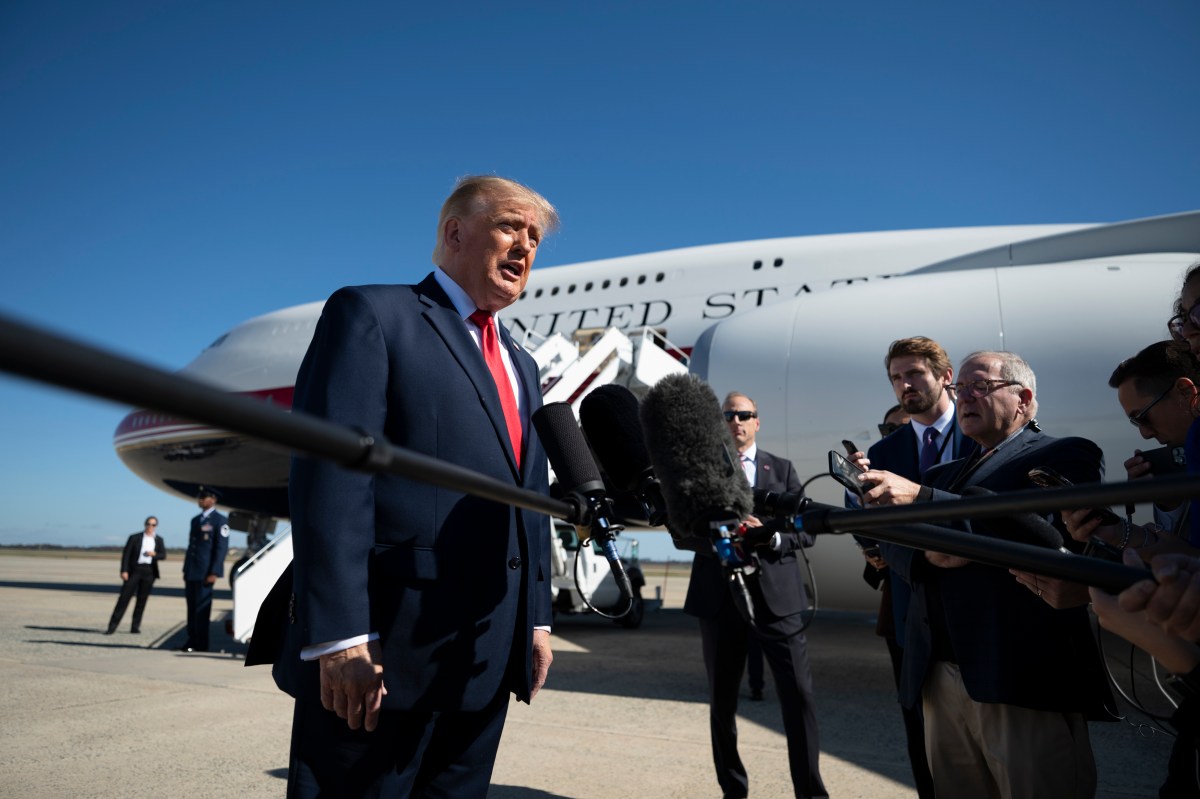 President Donald J. Trump disembarks Marine One at Joint Base Andrews, Maryland and speaks to the press before boarding Air Force One for a campaign trip to Port Huron, Michigan, Sunday, October 25, 2026. (Official White House photo by Joyce N. Boghosian)