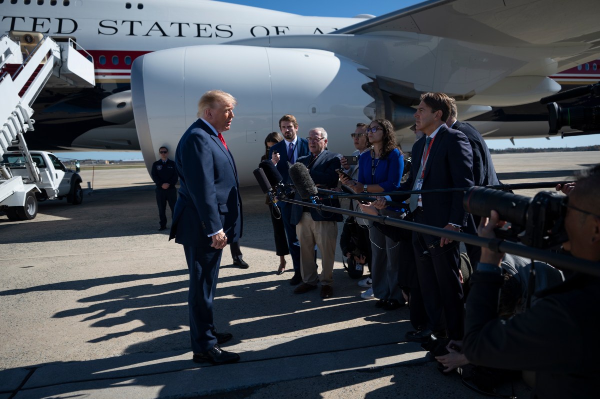 President Donald J. Trump disembarks Marine One at Joint Base Andrews, Maryland and speaks to the press before boarding Air Force One for a campaign trip to Port Huron, Michigan, Sunday, October 25, 2026. (Official White House photo by Joyce N. Boghosian)