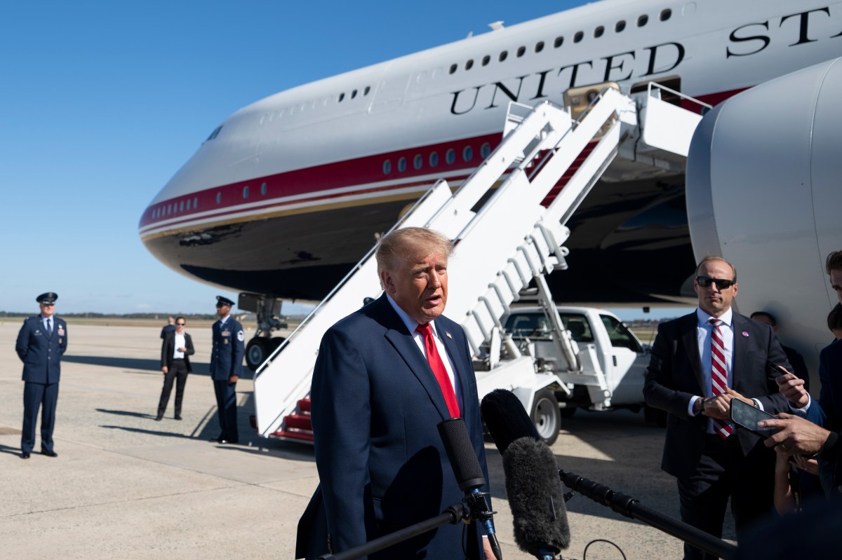 President Donald J. Trump disembarks Marine One at Joint Base Andrews, Maryland and speaks to the press before boarding Air Force One for a campaign trip to Port Huron, Michigan, Sunday, October 25, 2026. (Official White House photo by Joyce N. Boghosian)