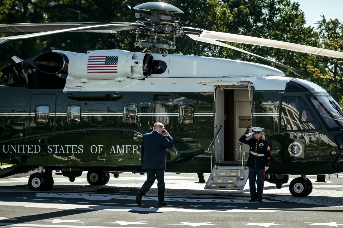 President Donald J. Trump speaks to members of the media before boarding Marine One on the South Lawn of the White House, en route to Michigan for a midterm rally, Sunday, October 25, 2026. (Official White House Photo by Patrick Witty)